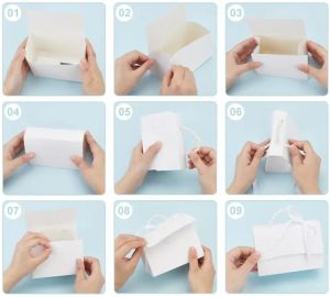 Подаръчна кутийка Чантичка с перлена дръжка - 13 см. х 9 см. х 7,5 см.